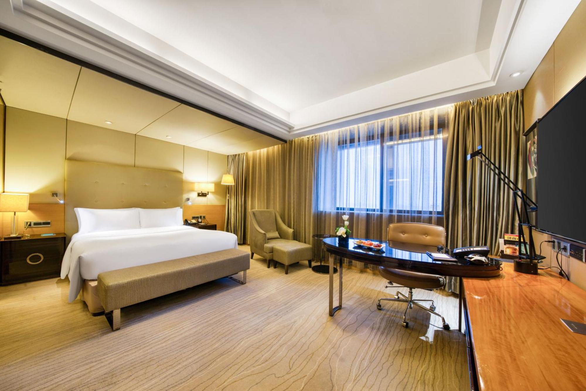 Enlux Hotel Цзинань Экстерьер фото